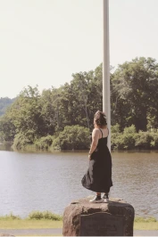 Selena on a rock overlooking the lake.